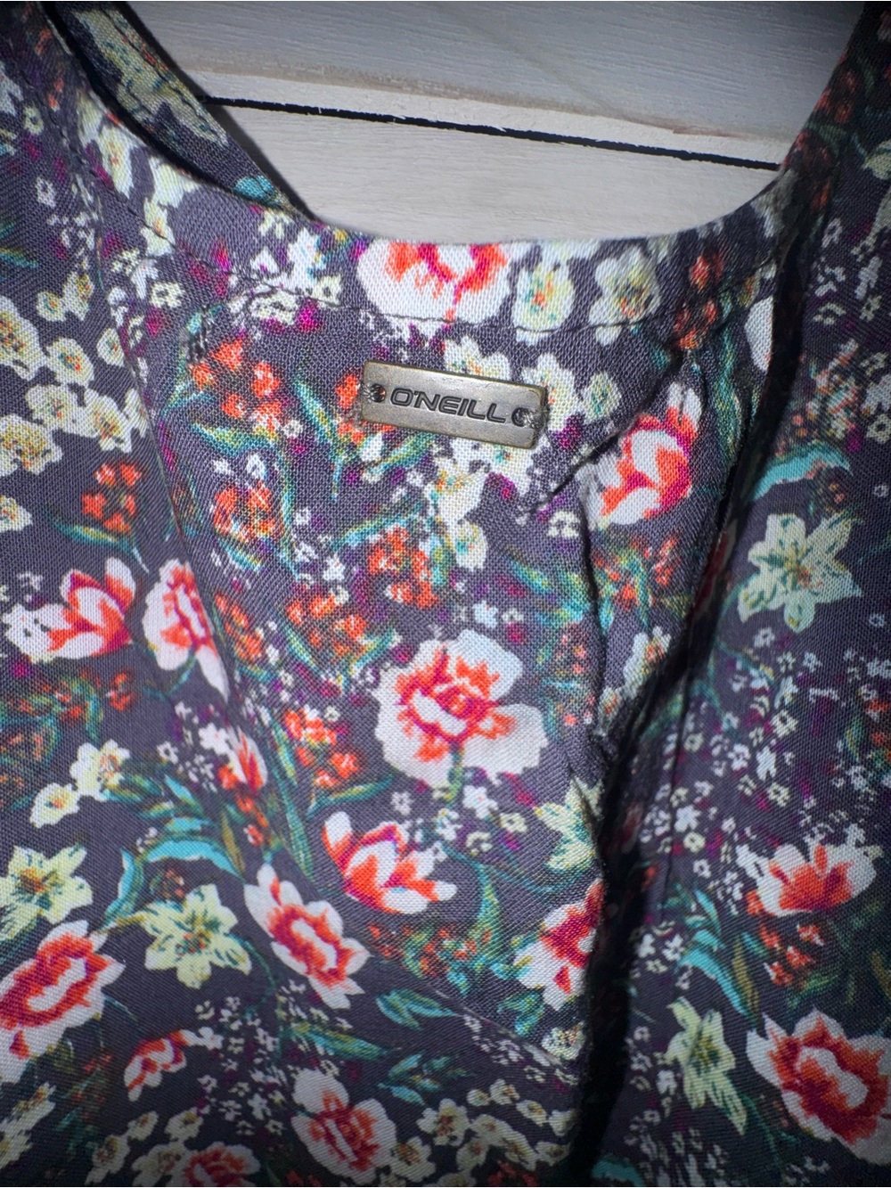 NWT O’Neill dress in Navy with multi color floral pattern
